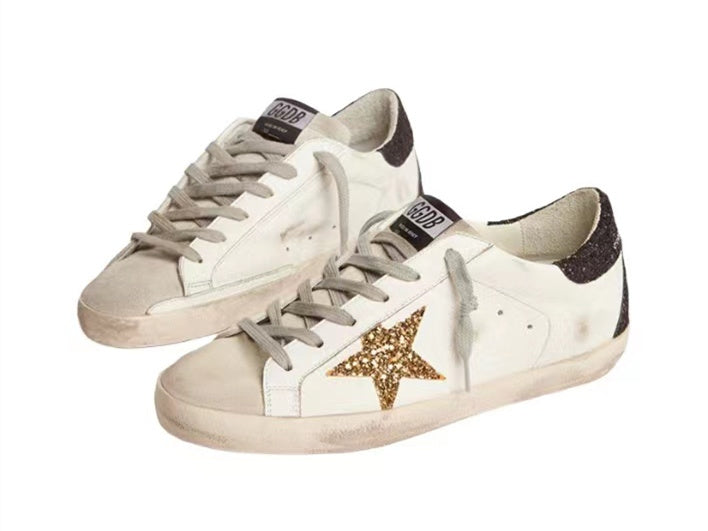 GOLDEN GOOSE حذاء سوبر ستار باللون الذهبي