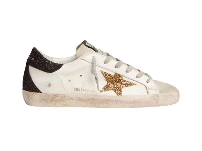 GOLDEN GOOSE حذاء سوبر ستار باللون الذهبي