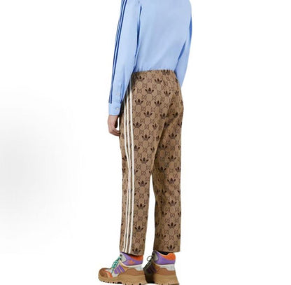 GUCCI x adidas originals - Adidas x Gucci collaboration collection - Letter logo printed stretch pants - Knitted sport pants - Men's style - Brown color