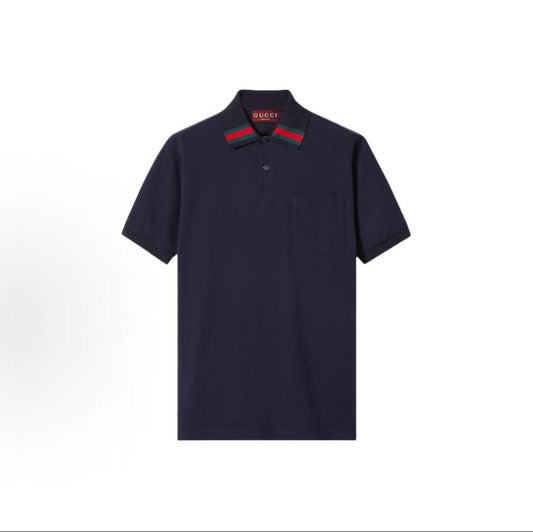 GUCCI Polo shirt with shoulder-hugging collar and button closure, for men. Navy blue color.