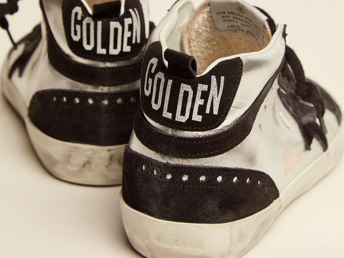 GOLDEN GOOSE حذاء سنيكرز Mid Star LTD من الجلد الفضي اللامع والجلد السويدي الأسود