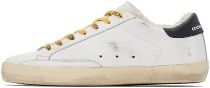 GOLDEN GOOSE حذاء رياضي كلاسيكي سوبر ستار باللونين الأبيض والأصفر
