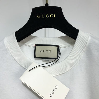 GUCCI COTTON JERSEY T-SHIRT WITH GUCCI MIRROR PRINT – GGS016