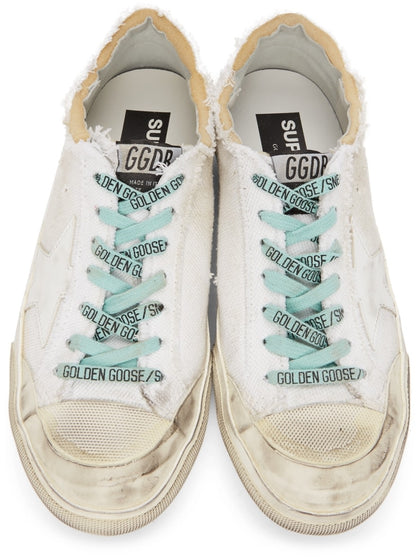 GOLDEN GOOSE حذاء سنيكرز سوبر ستار بنستار أبيض