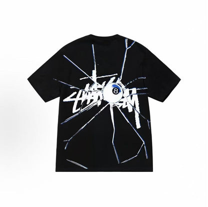 Stussy SS23 SS23 Spring Summer Collection 8 Ball Series SHATTERED TEE - A loose round-neck short-sleeved T-shirt with a black 8 pattern and an alphabet logo print. Available for both men and women.