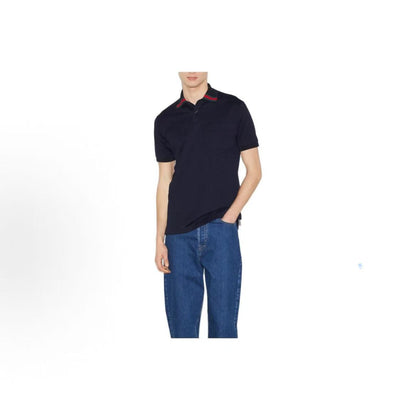 GUCCI Polo shirt with shoulder-hugging collar and button closure, for men. Navy blue color.