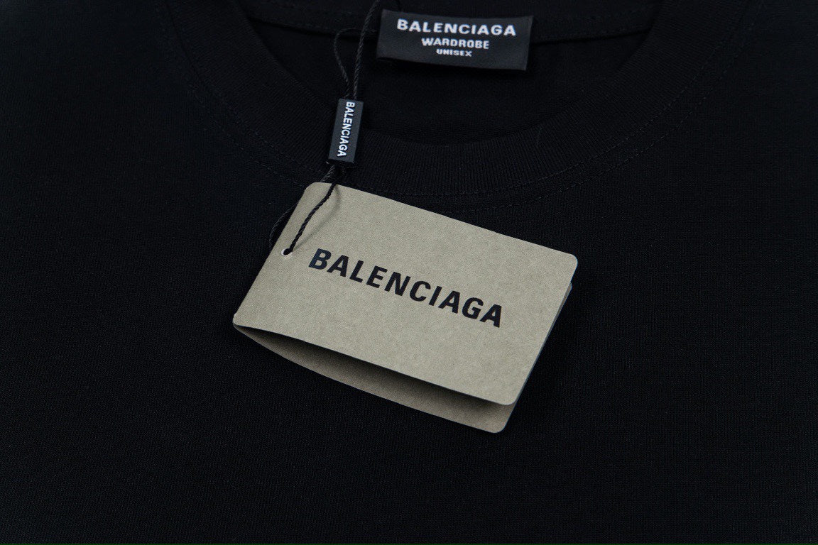 Balenciaga short-sleeve T-shirt featuring the classic fluid logo print and Labubu doll graphic.